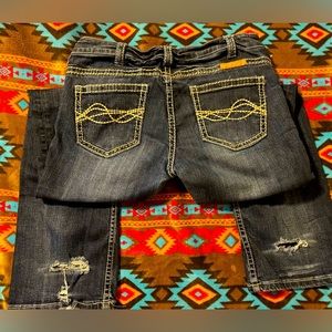 Cowgirl, tuff jeans, where in the heel area as shown.